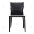 Black saddle leather armless dining chairs